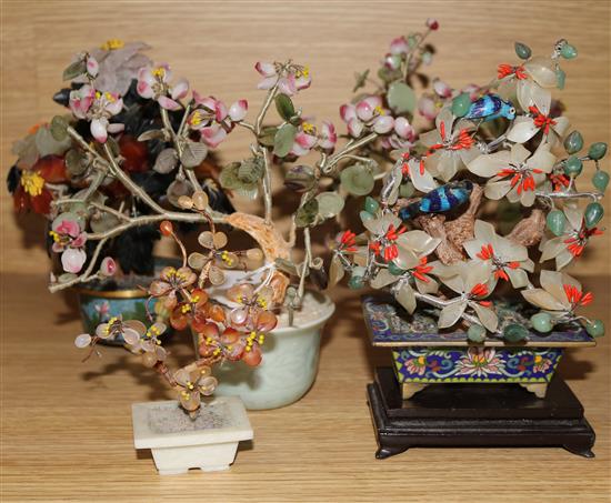 A collection five assorted Eastern hardstone models of Chinese trees, largest 19cm